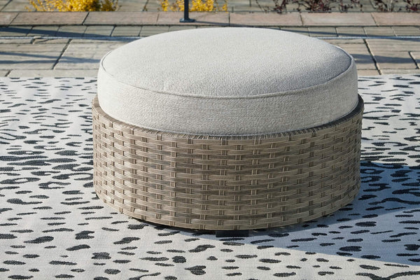 P458-814 Brown/Beige Contemporary Calworth Outdoor Ottoman with Cushion By Ashley - sofafair.com