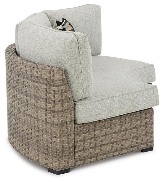 Calworth Outdoor Curved Loveseat with Cushion P458-861 Brown/Beige Contemporary Outdoor Loveseat