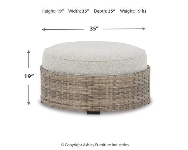 P458-814 Brown/Beige Contemporary Calworth Outdoor Ottoman with Cushion By Ashley - sofafair.com